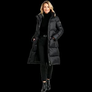 Person in formal attire with long black puffer coat