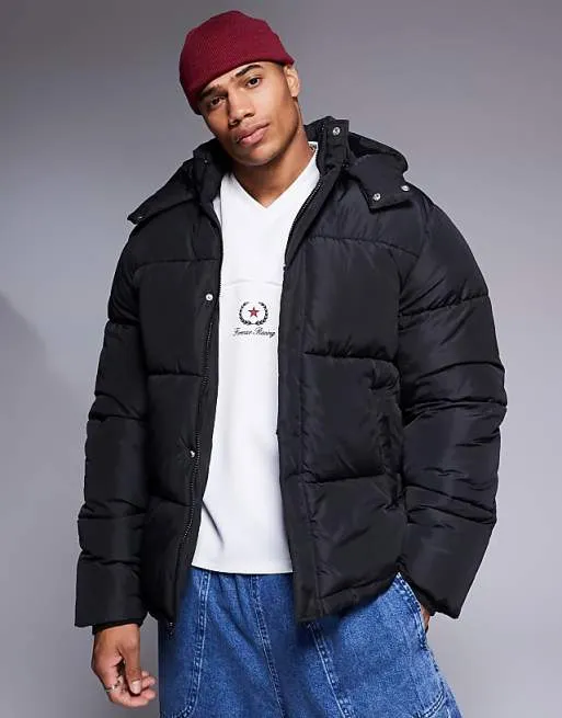 Man wearing a versatile black puffer jacket