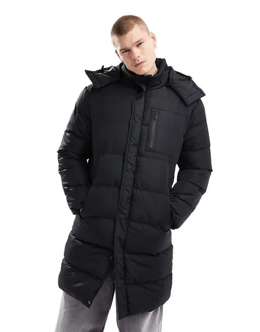 Man wearing a versatile black puffer jacket