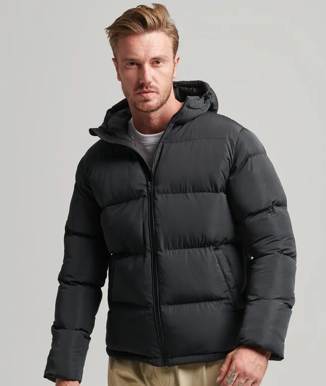 Man wearing a versatile black puffer jacket